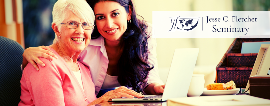 Grey haired white female student with younger female Hispanic student. Both women are embracing and smiling with a laptop in the picture's frame.