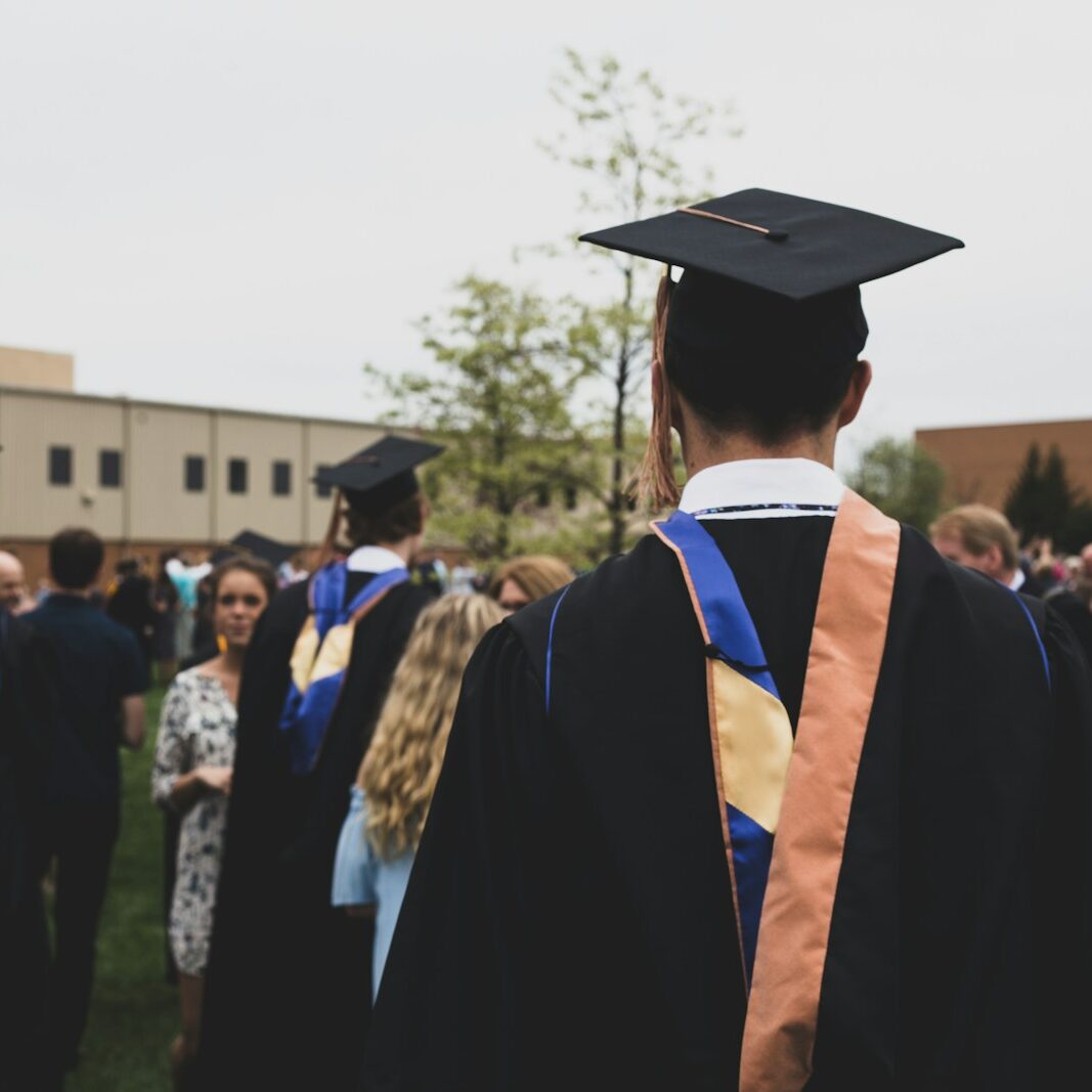 man wearing academic gown